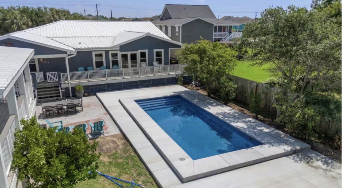 Pool and covered deck at the 2027 Galveston retreat house