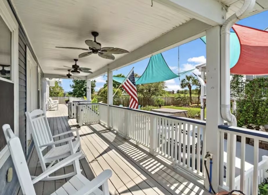 Covered porch with rocking chairs